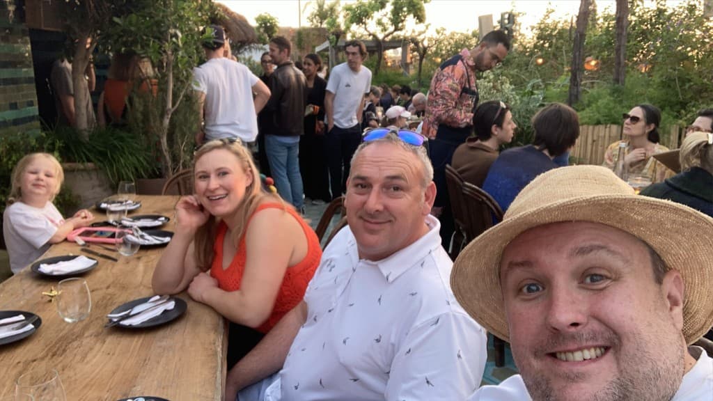 Adam City Tours clients enjoying a convivial dinner together in Marrakech